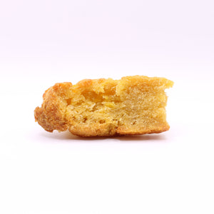 Single Daisy Roo Alaskan cod dog treat on a white background