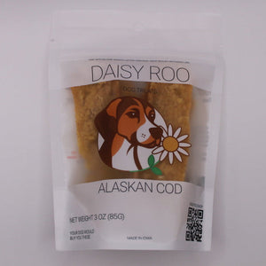 Daisy Roo Alaskan Cod pet food package on a white textured surface